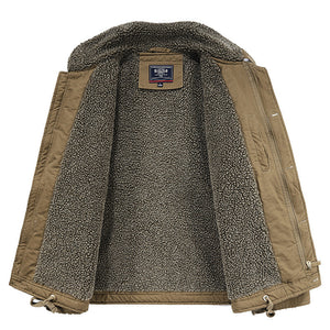 Green jacket with sherpa lining on a pink background